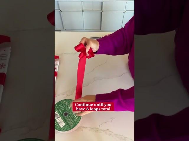 Learn how to make a fancy bow and step up your gift wrapping this holiday season? Link in comments.
