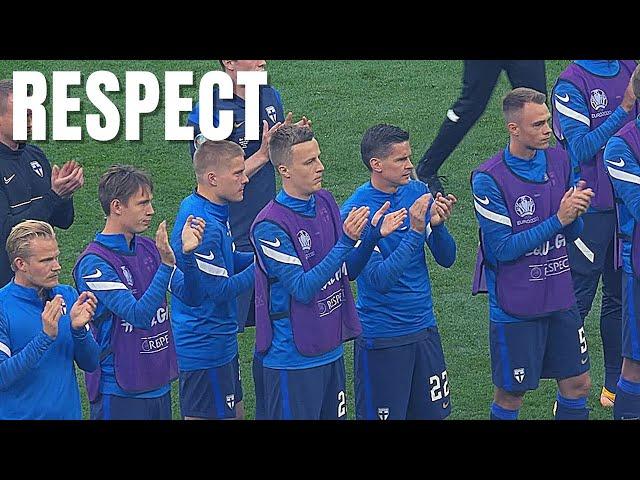 Finland players applaud as Denmark returns to the pitch after Eriksen’s collapse