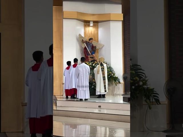 Veneration of St. Michael the Archangel statue. #catholic