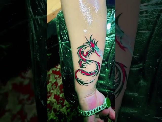 Dragon tattoo hand red clouring allen 3d tattoo house Nepal pokhara prashyang