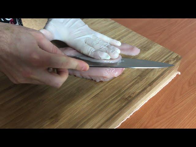 SHANZU CLASSIC chef knife slicing the chicken breast