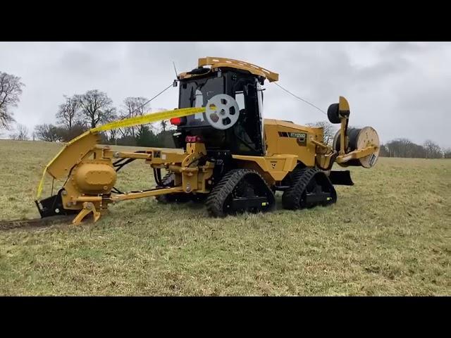 Vermeer RTX1250i2 quad track vibratory mole plough installing rural fibre.