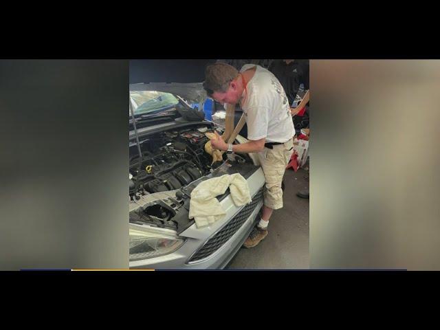 Mechanics find massive snake in car