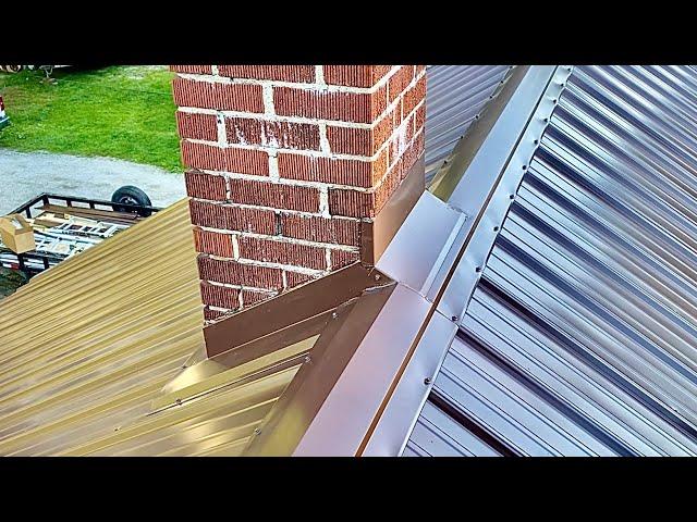 Chimney flashing on a metal roof.