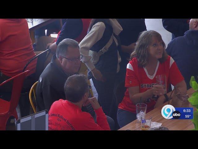 Syracuse lacrosse fans watch NCAA semifinal game against Maryland at Harvey's Beer Garden