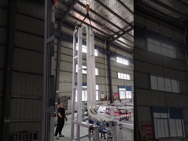 Maxsen gripper conveyor with small bottles testing  vertical transportation solution