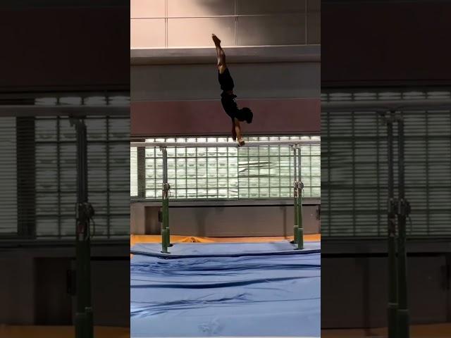 Wow! Triple back dismount from p.bars!