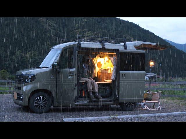 Solo camping in a tiny car in the rain