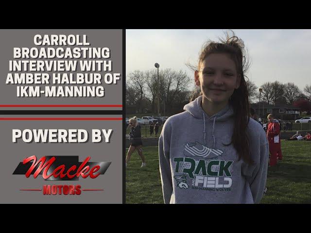 Tyler Brunner talks with Amber Halbur of IKM-Manning on her event at the Audubon coed meet 4-27-21