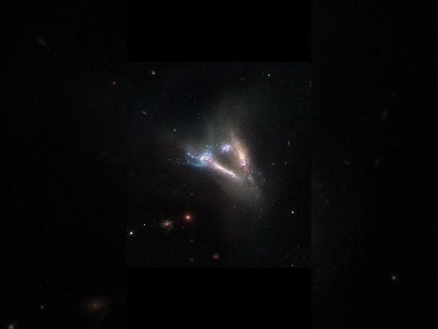 IC 2184: A Cosmic Flying V, Approximately 55 Megaparsecs Away, #shorts