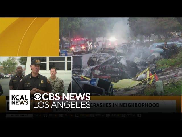 Officials hold a news conference in the neighborhood of the San Diego small plane crash