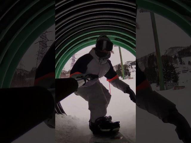 Try something different- Snowboarding through the small tunnel