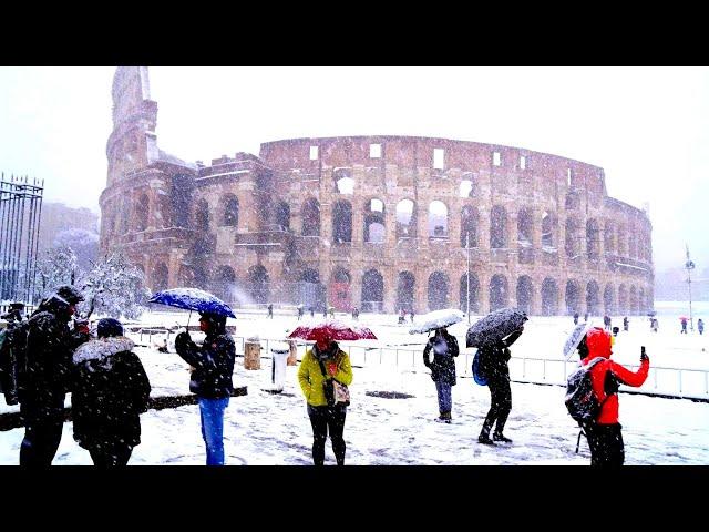 Wild snowfalls cover Italy while floods hit the plains