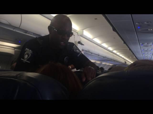 Lady Fights Police On American Airlines Flight Part 1