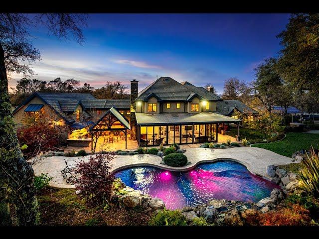 This grand country estate features abundant acreage, and exceptional  amenities!