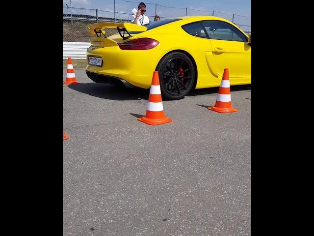 Porsche Cayman (981) GT4 driving with angry Sound