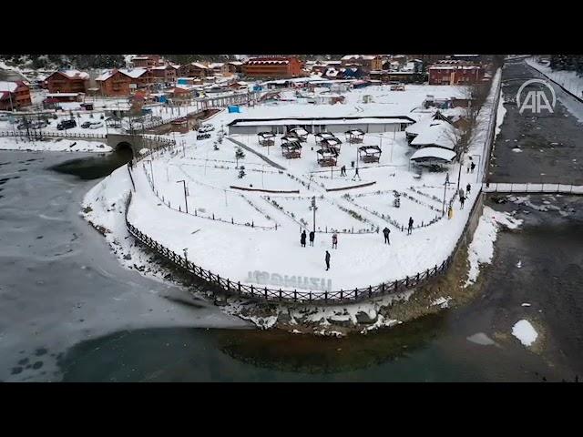 Frozen lake Uzungol in northern Turkey attracts visitors