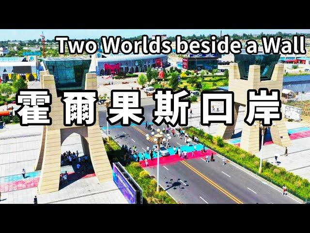 A video takes you to the Horgos Port of Xinjiang. A wall separates two worlds. Just across is Kazak