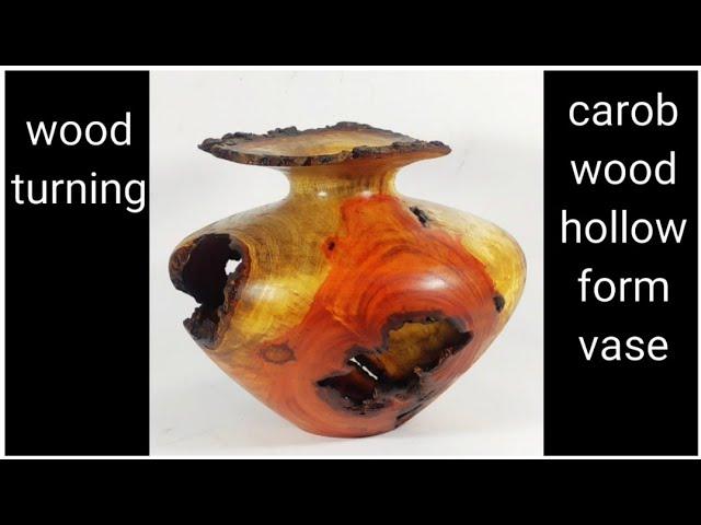 wood turning a carob wood hollow form vase