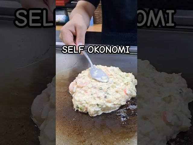 Making okonomiyaki by myself