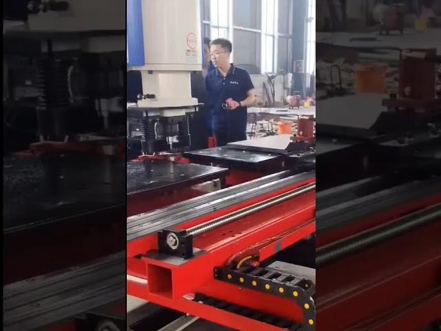 Iron worker with auto feeding worktable