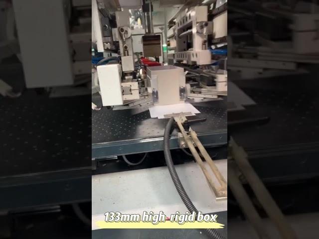Automatic rigid box making machine. Robot with viable system. Accurate #rigidbox #rigidboxmachine