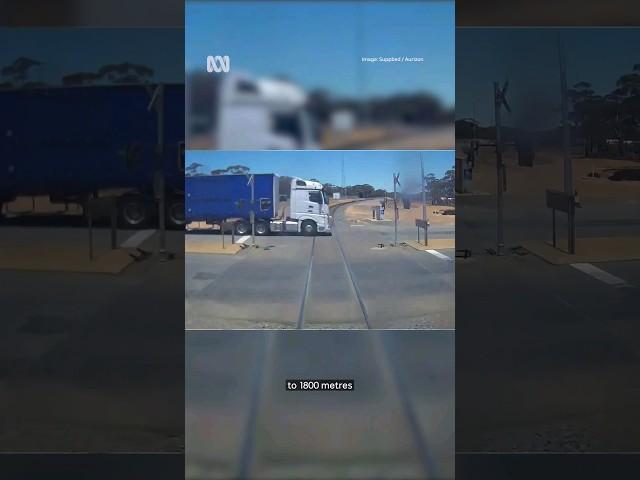 Freight train and truck seconds from disastrous collision