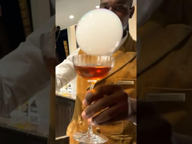 Smoked Manhattan at the Malt Whiskey Bar on Explora Journeys | By Mureta on Explora II