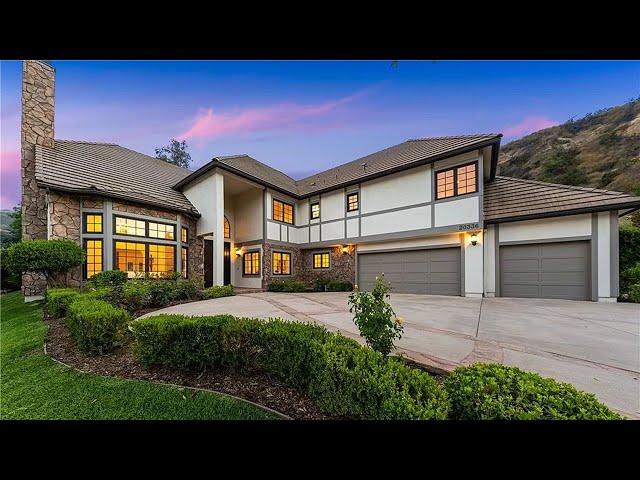 Asking $2,995,000! Magnificent estate in a beautiful part of Woodland Hills CA with 6 Beds + 6 Baths