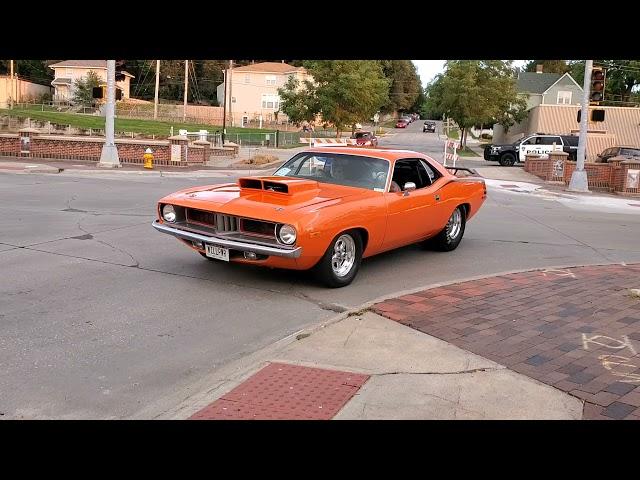 Cars leaving the 2019 100 Block Car Show in Council Bluffs, Iowa