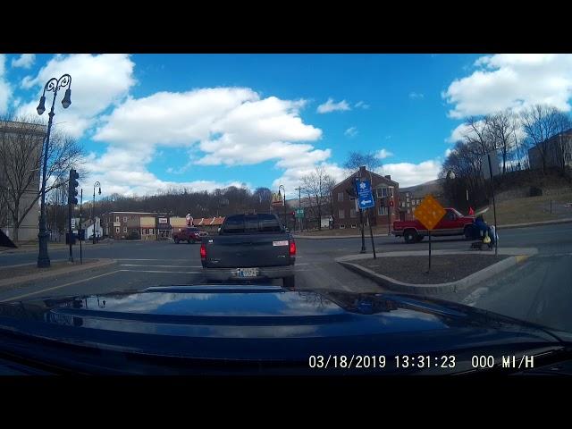 Asshat Goes Through a Red Light