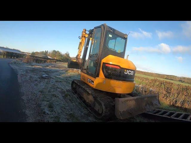 Jcb Mini Digger earning its Keep , all sorts Going on