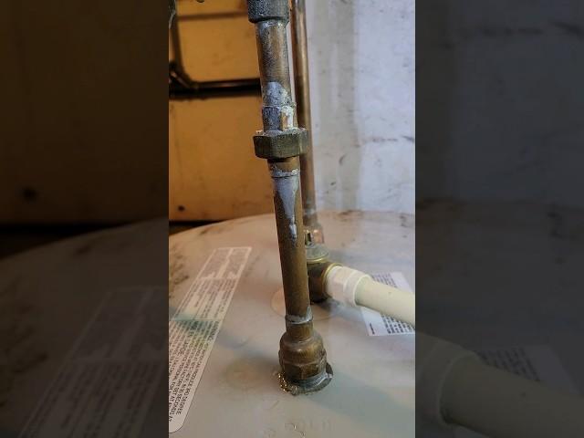 Hot Water Heater Tank Leaking From Top. Tank Must Be Cracked Inside