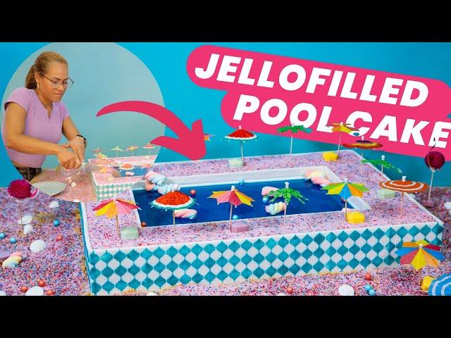 Jello-filled SWIMMING POOL CAKE with  marshmallow floaties  | How to Cake It With Yolanda Gampp