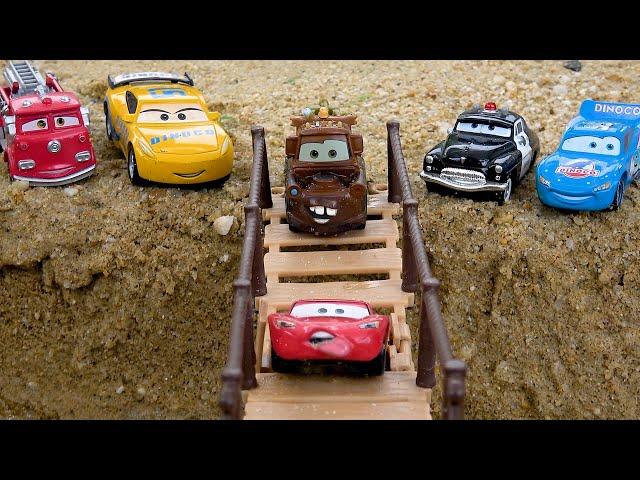 Disney toy cars on the bridge with crocodile funny | Disney toy cars transformer story collection