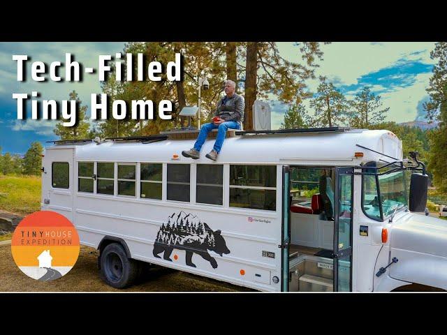 He built a $35k Tech-Filled Tiny Home Skoolie to live a full life!