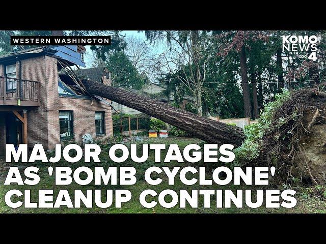 Hundreds of thousands remain in the dark as crews cleanup massive damage from 'bomb cyclone'