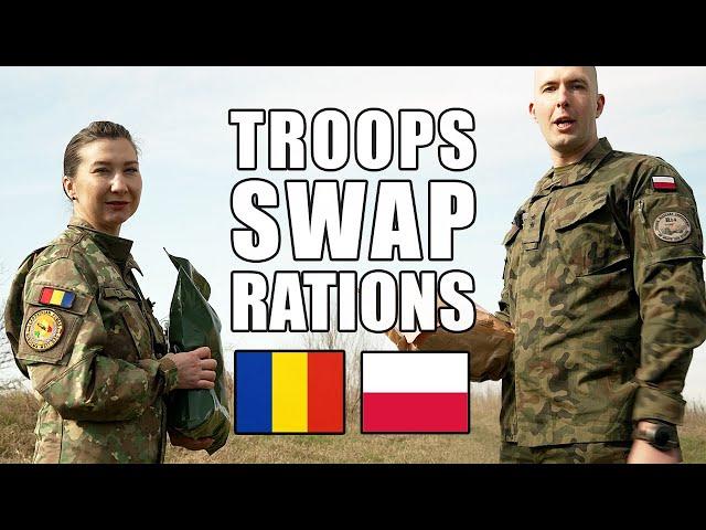 Polish  and Romanian  soldiers swap rations