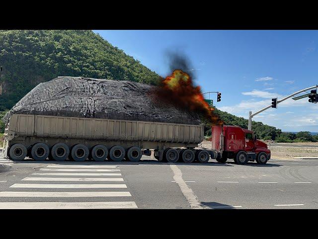 heavily loaded trucks is passing by on the highway. S10-E2