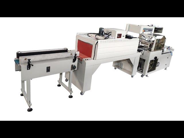 Low price automatic arrange maxi roll paper shrink packing machine