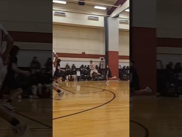 8th grader Aaron Webb two one-step in-game dunks