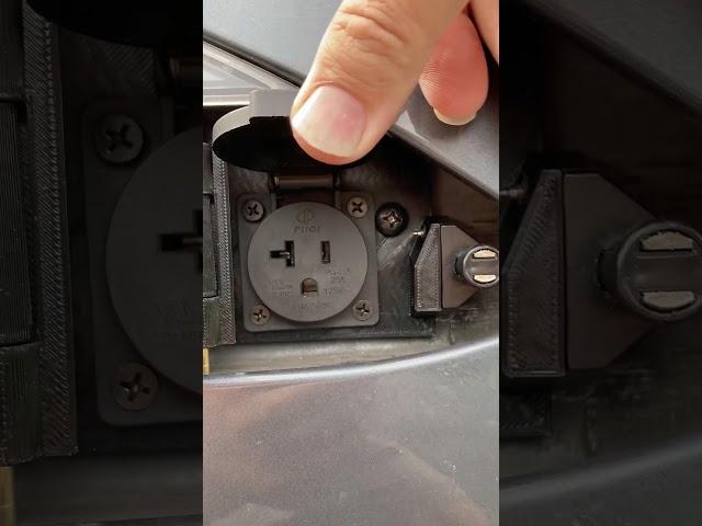 Tesla V2L Taillight port pops open