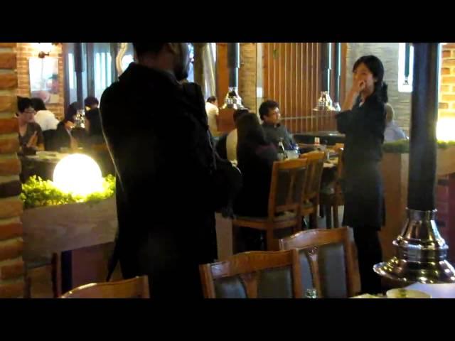 Zach Gilbert Showing Moves at a South Korean Restaurant
