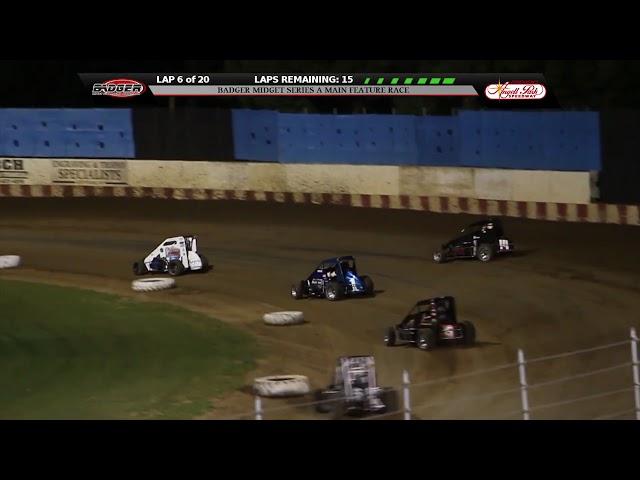 OVER THE WALL! Badger Midget Driver, Scott Hatton, goes over the fence at Angell Park Speedway!