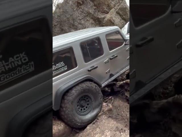Axial SCX6 Rubicon pounding the rocks.