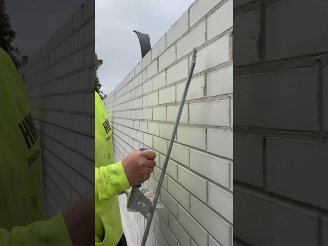 Adding the finishing touches to another wall on our Blackburn North build  #bricklayer #brickwork