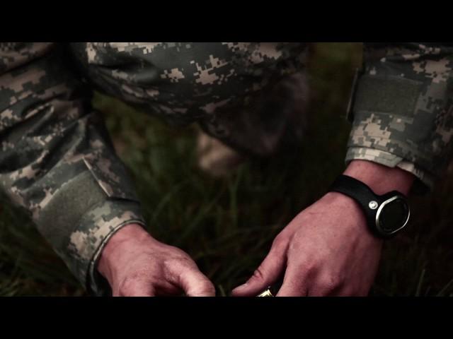 Married soldier loads a pistol magazine