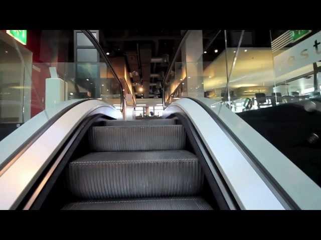 An escalator journey in Zürich