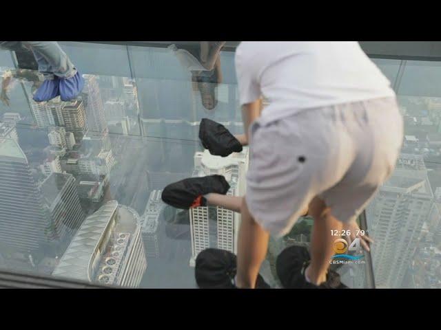 Glass Floor Opens Up On Tall Building