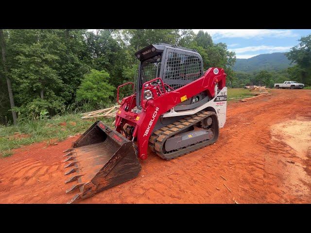 Grading with the New toy. First time running a skid steer #takeuchi